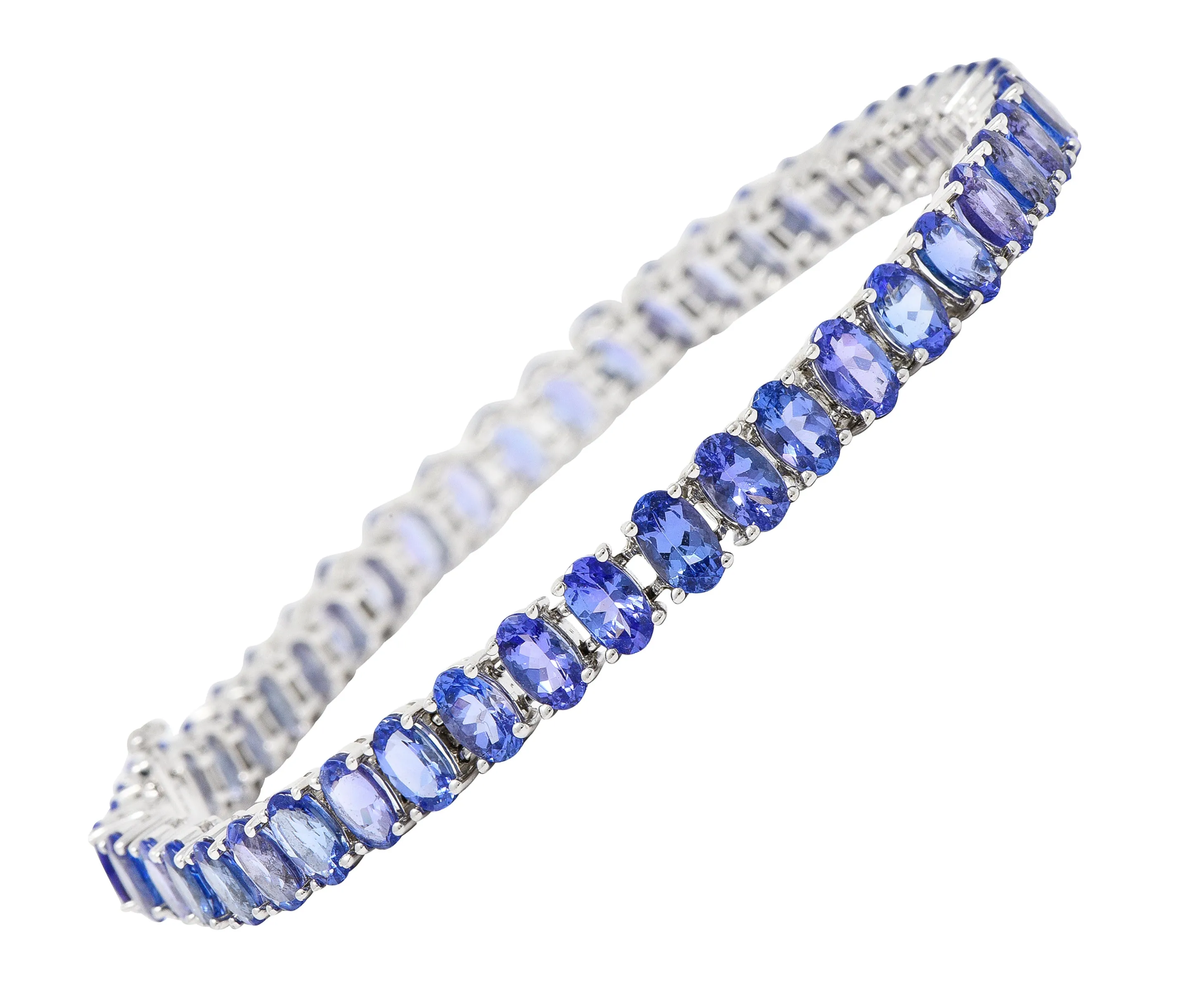 Contemporary 12.00 CTW Oval Cut Tanzanite 14 Karat White Gold Line Bracelet