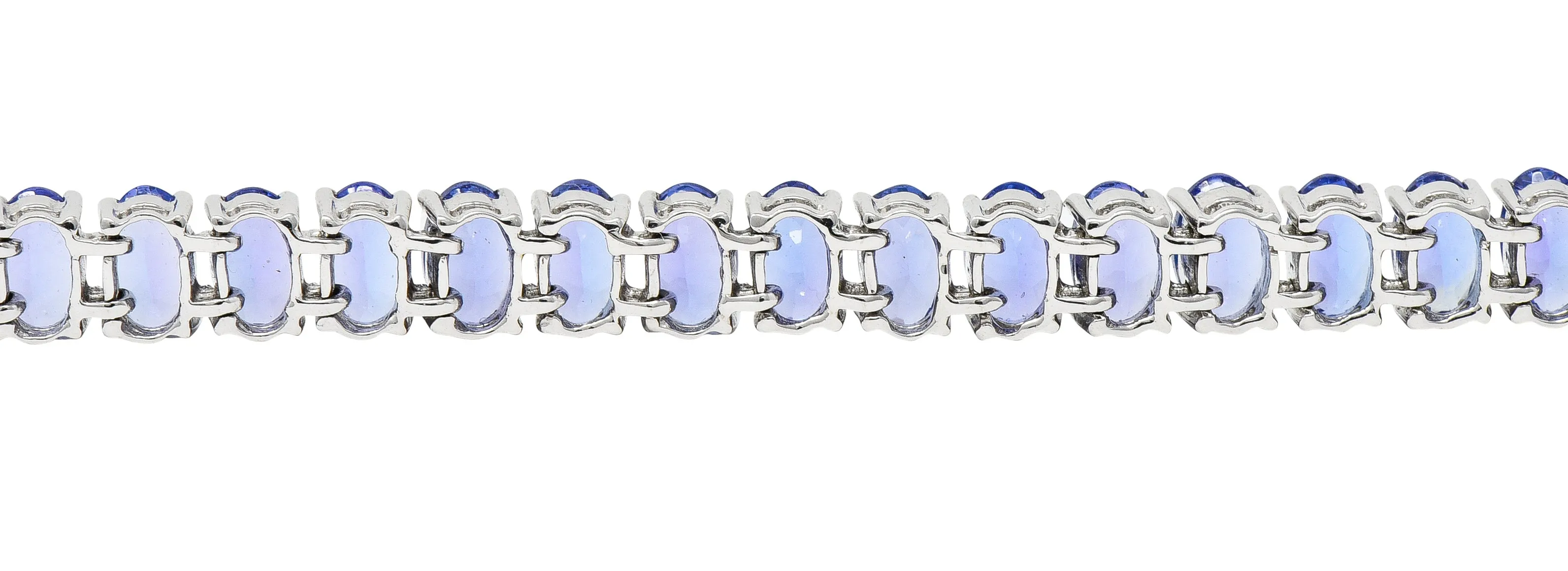 Contemporary 12.00 CTW Oval Cut Tanzanite 14 Karat White Gold Line Bracelet