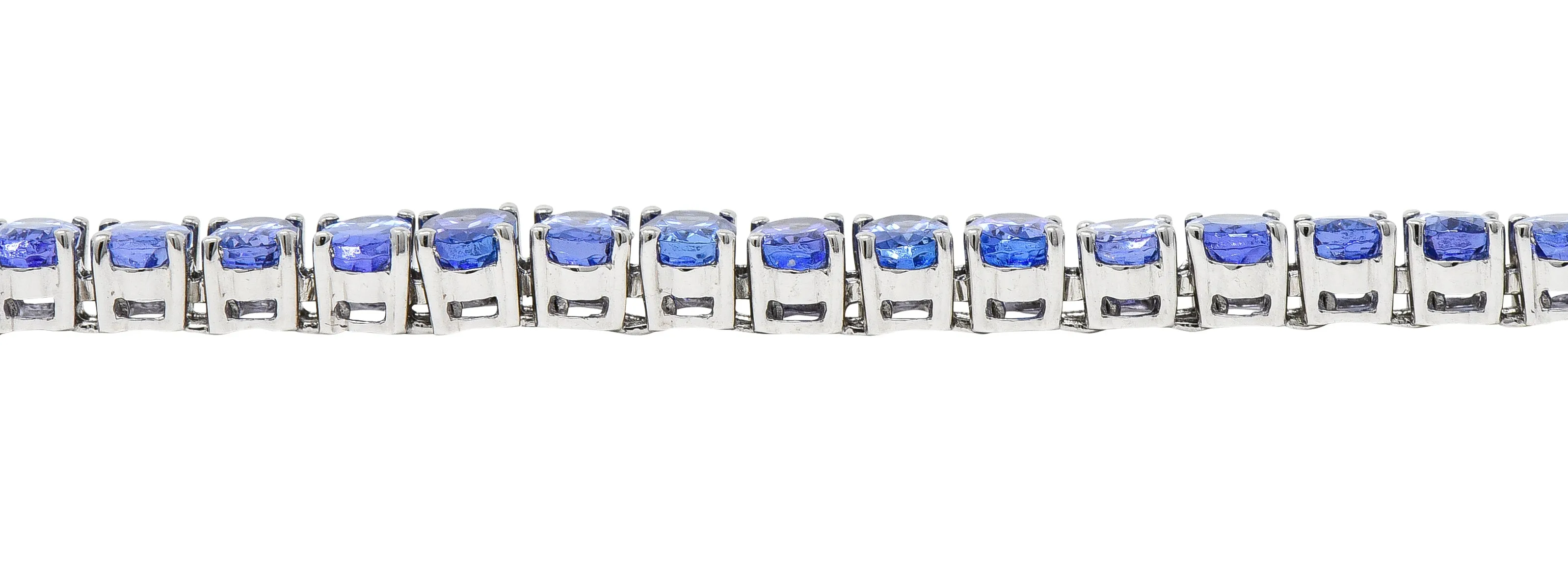 Contemporary 12.00 CTW Oval Cut Tanzanite 14 Karat White Gold Line Bracelet