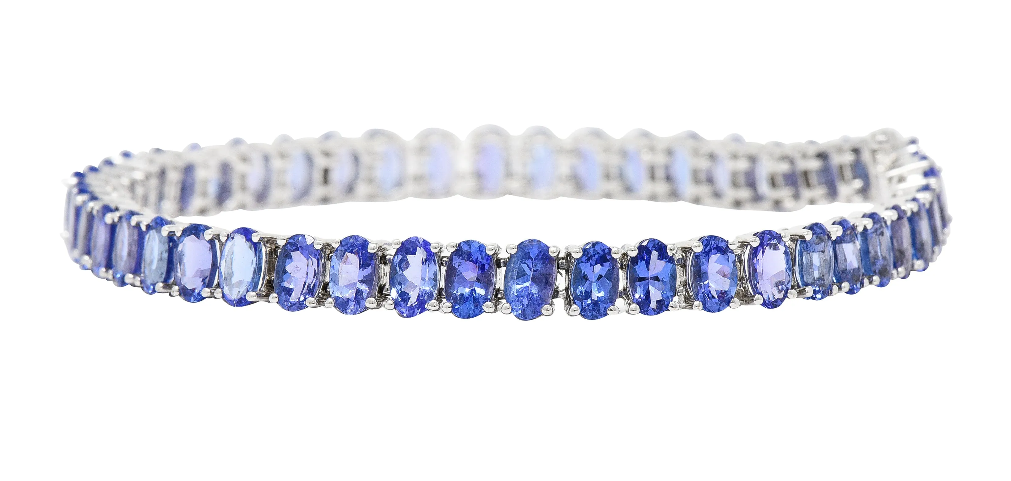 Contemporary 12.00 CTW Oval Cut Tanzanite 14 Karat White Gold Line Bracelet