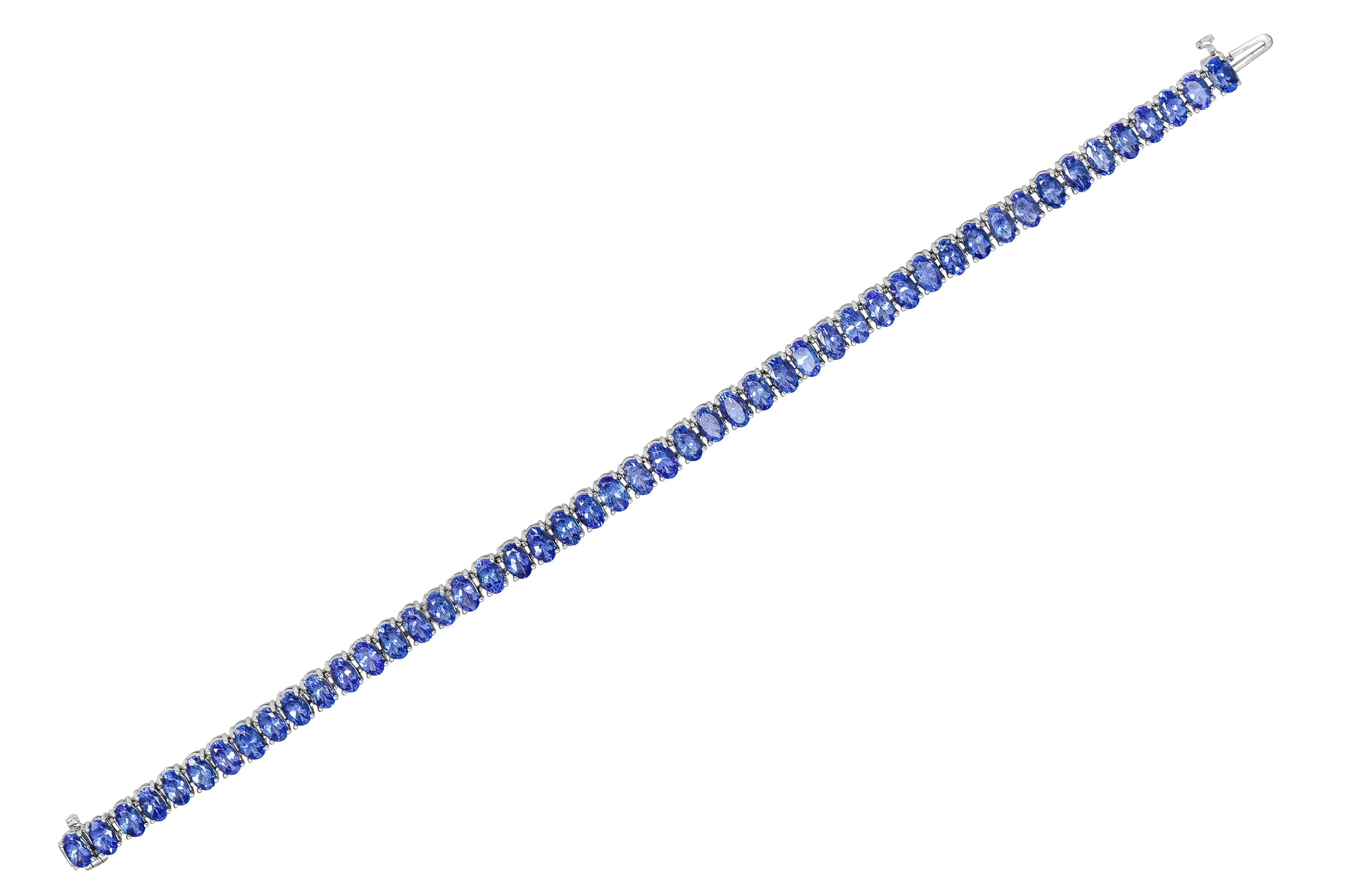 Contemporary 12.00 CTW Oval Cut Tanzanite 14 Karat White Gold Line Bracelet