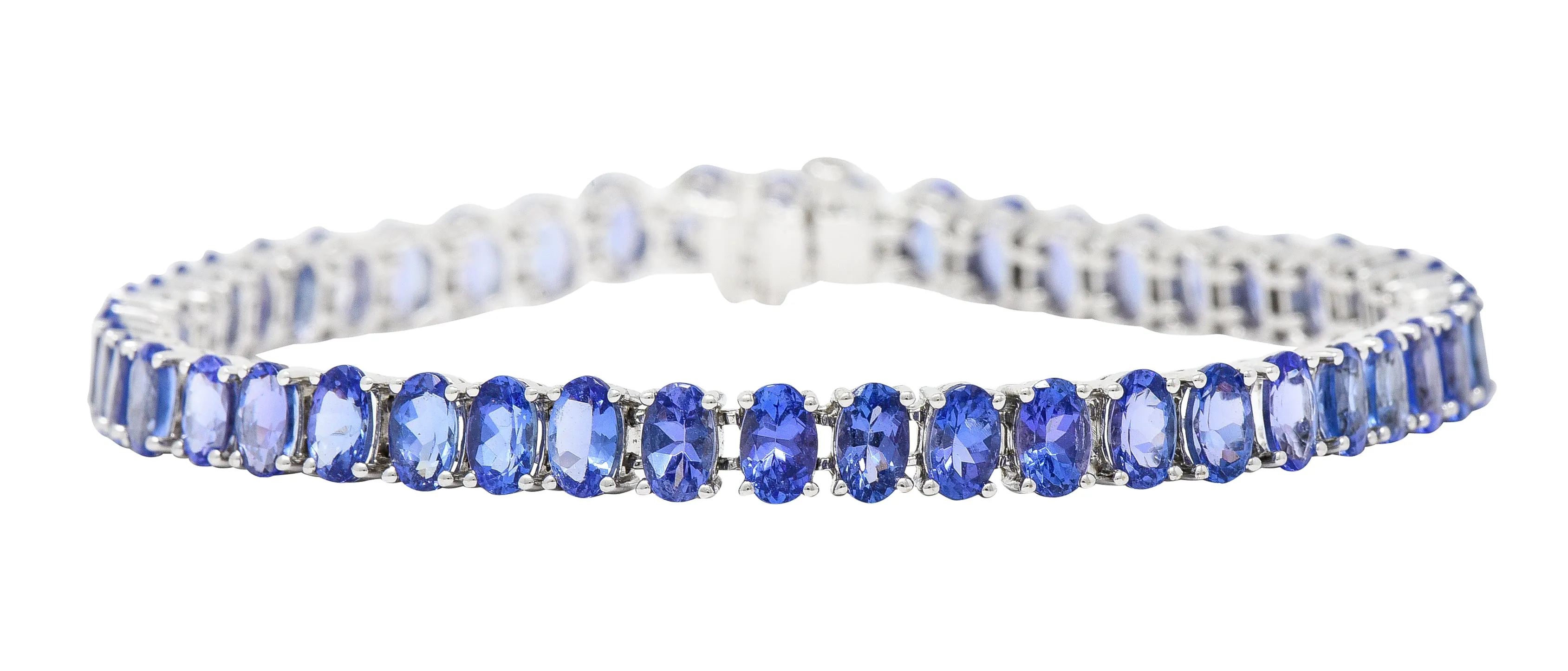 Contemporary 12.00 CTW Oval Cut Tanzanite 14 Karat White Gold Line Bracelet