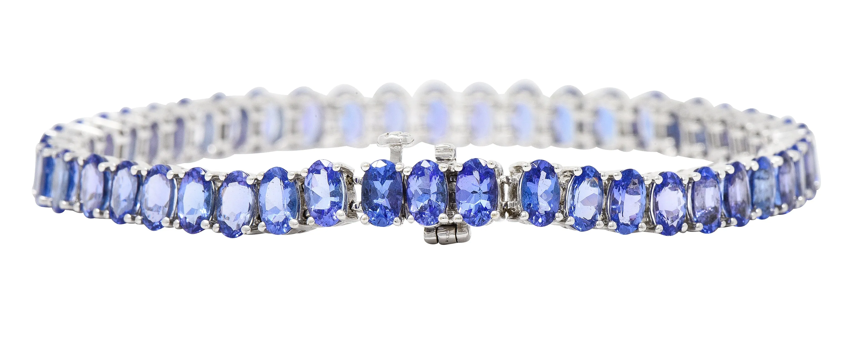 Contemporary 12.00 CTW Oval Cut Tanzanite 14 Karat White Gold Line Bracelet