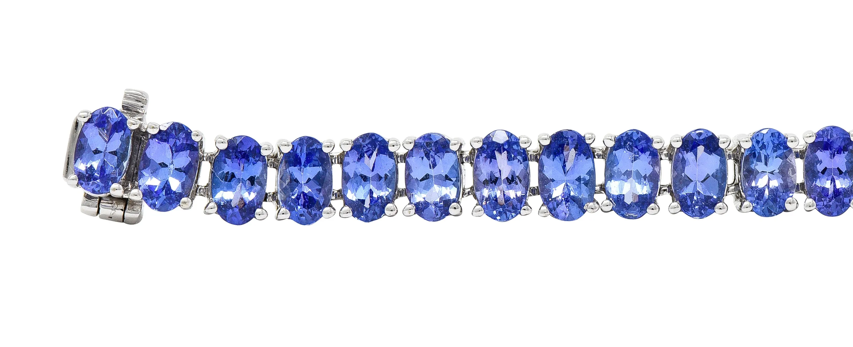 Contemporary 12.00 CTW Oval Cut Tanzanite 14 Karat White Gold Line Bracelet