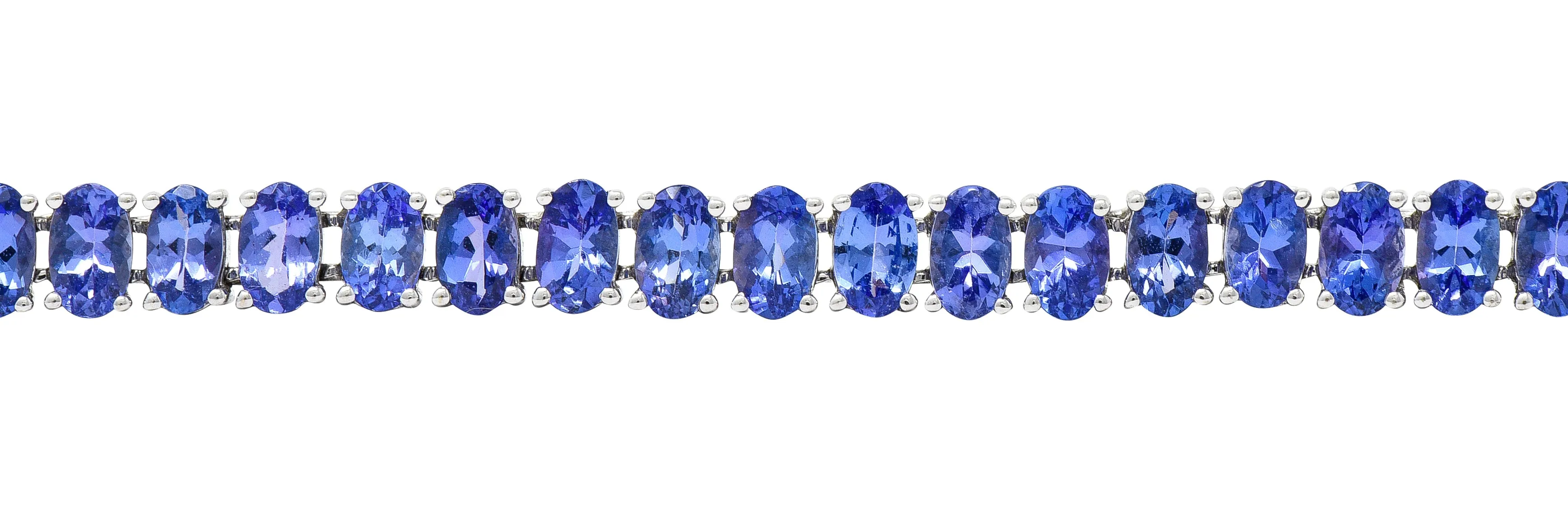 Contemporary 12.00 CTW Oval Cut Tanzanite 14 Karat White Gold Line Bracelet