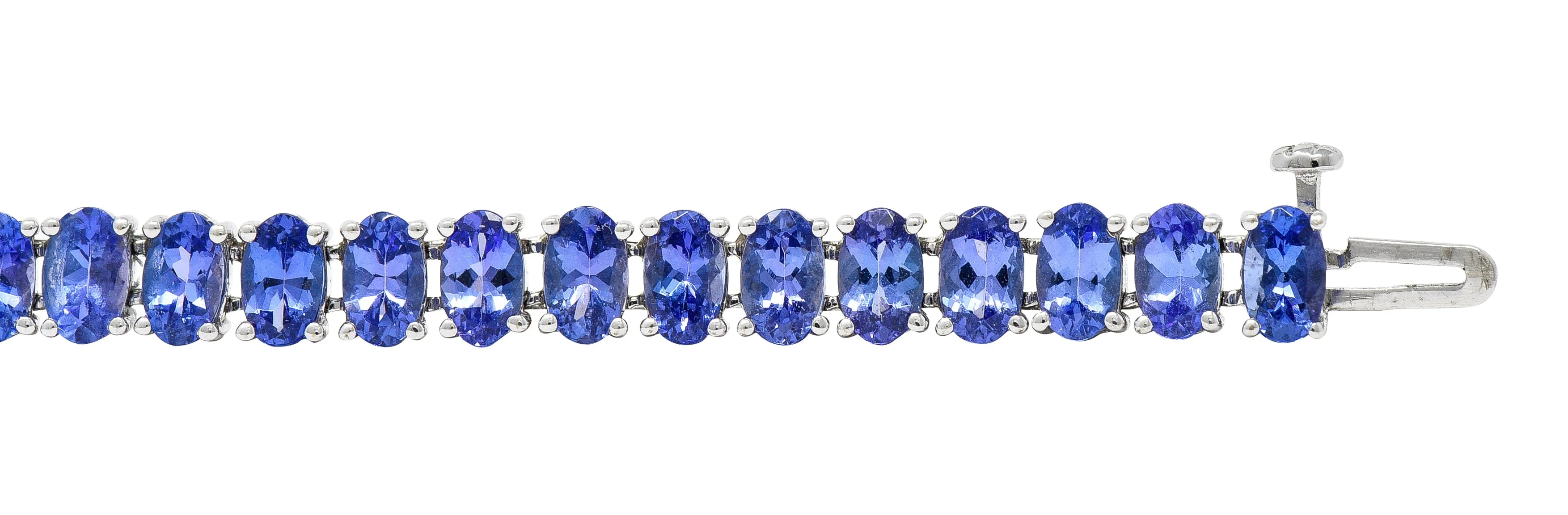 Contemporary 12.00 CTW Oval Cut Tanzanite 14 Karat White Gold Line Bracelet