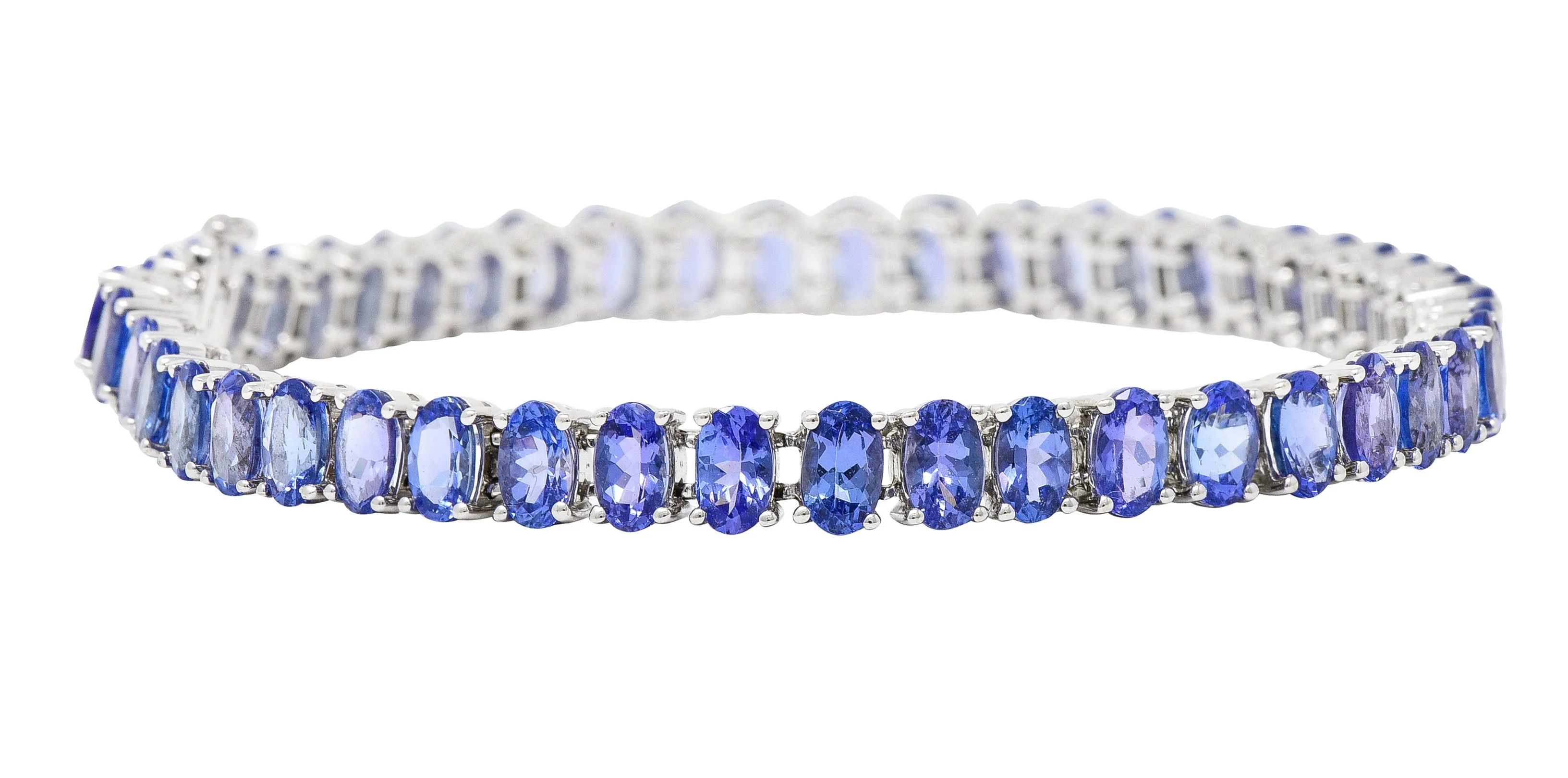 Contemporary 12.00 CTW Oval Cut Tanzanite 14 Karat White Gold Line Bracelet