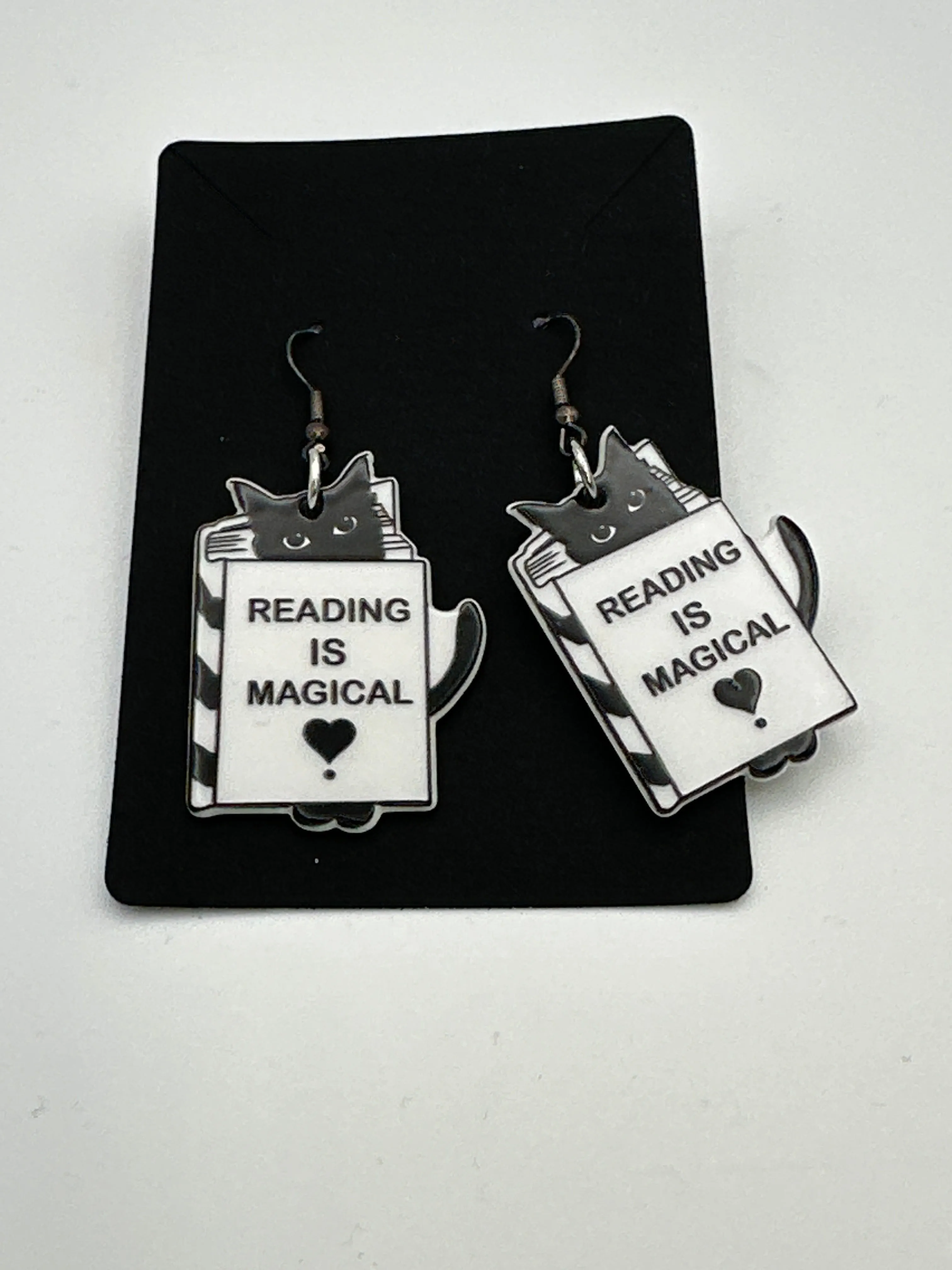 Reading is magical double sided acrylic earrings