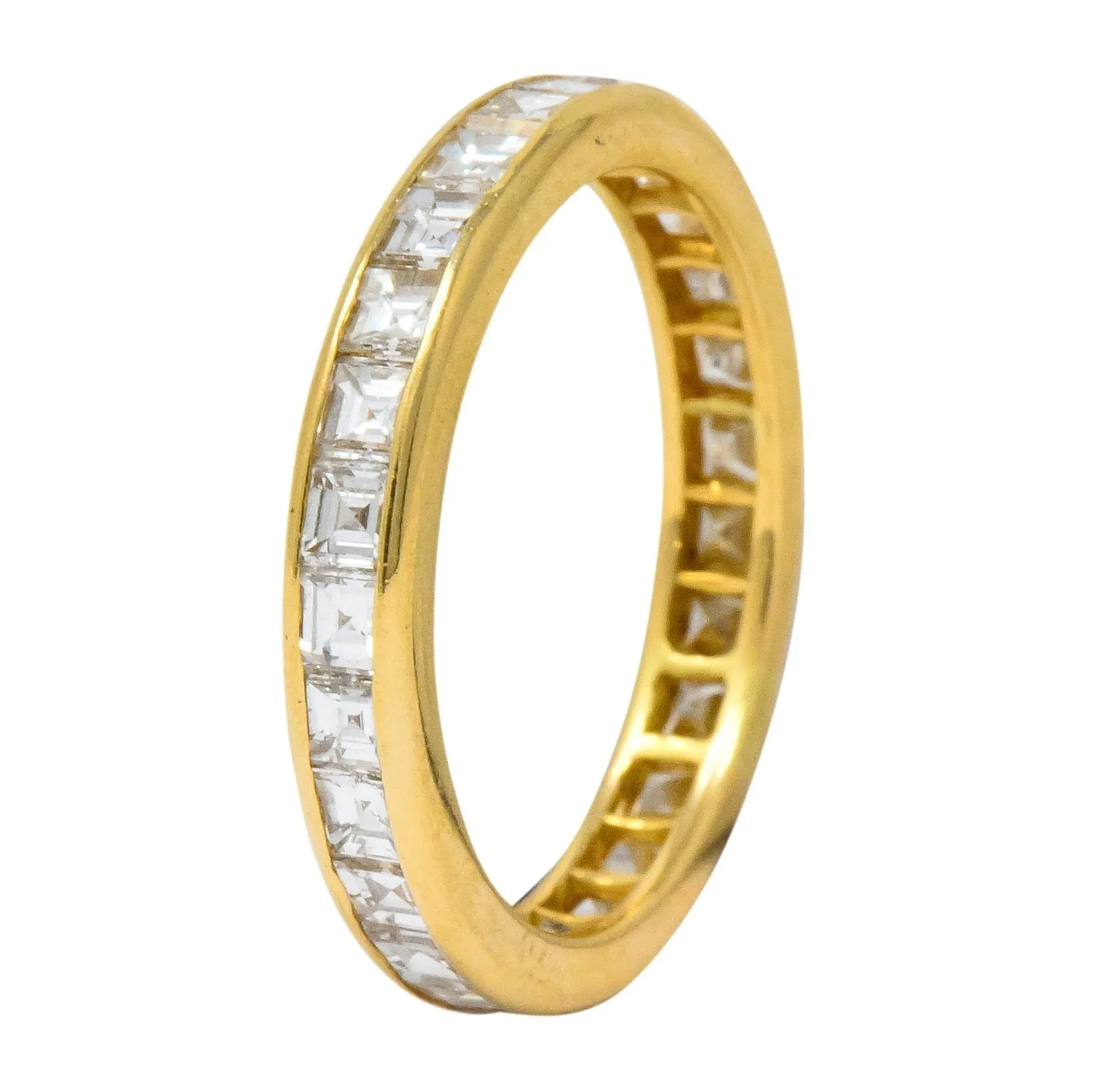 Sleek Oscar Heyman Contemporary 1.35 CTW Square Step Cut Diamond 18 Karat Gold Eternity Band