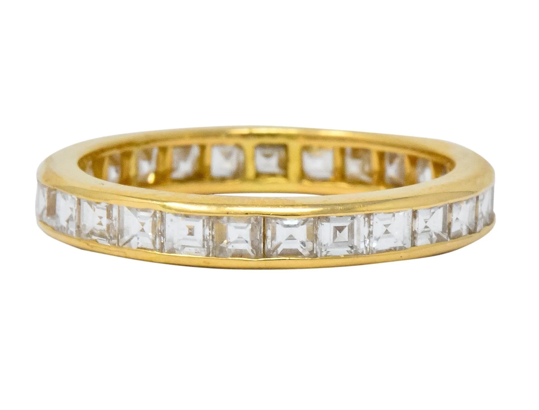 Sleek Oscar Heyman Contemporary 1.35 CTW Square Step Cut Diamond 18 Karat Gold Eternity Band