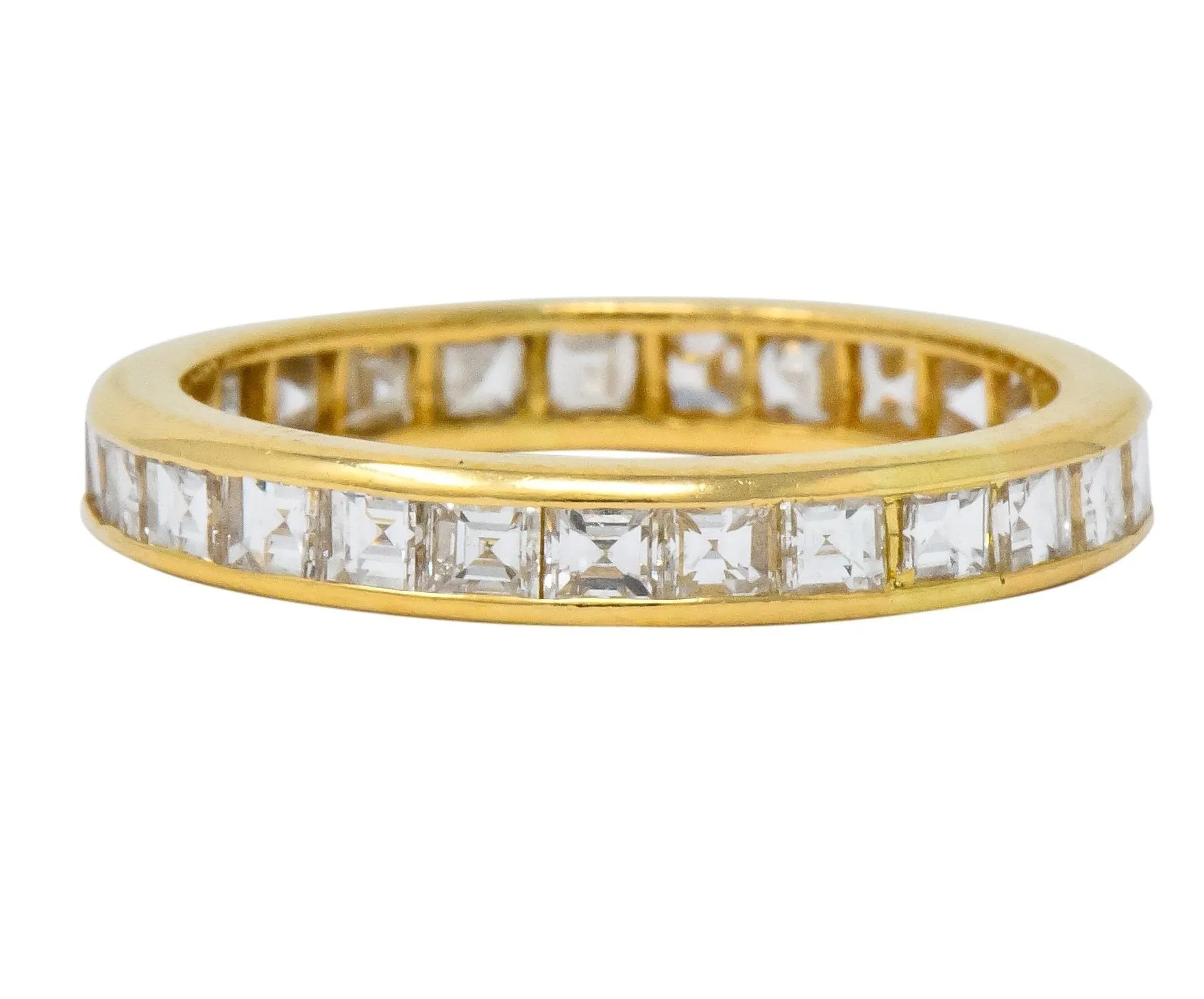 Sleek Oscar Heyman Contemporary 1.35 CTW Square Step Cut Diamond 18 Karat Gold Eternity Band